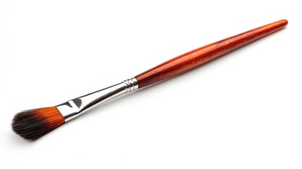 Fototapeta premium A single artist paintbrush with a wooden handle