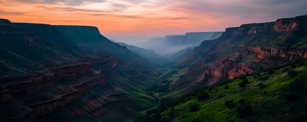 Fototapeta premium Drone view of a sprawling canyon with layered rock formations 