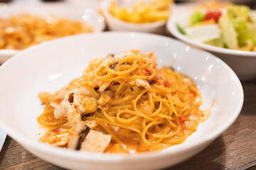 Spicy Chicken Cheese Tomato Bolognese Pasta Farfalle photo for use on menus and Italian restaurant websites