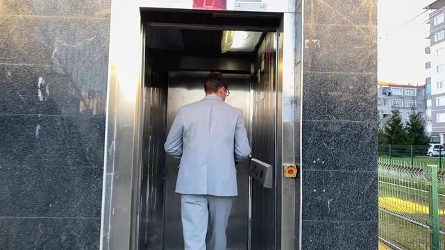 a worker in an elevator