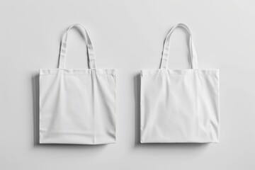 Two blank white tote bags on a light gray background. (2)