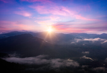 Sunrise in the morning at the top of the mountain, Thailand.