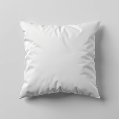 Obraz premium White square pillow on a light grey background.