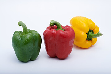 Fresh vegetables for cooking or eating raw photographed against a light background