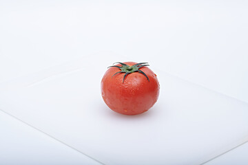 Fresh vegetables for cooking or eating raw photographed against a light background