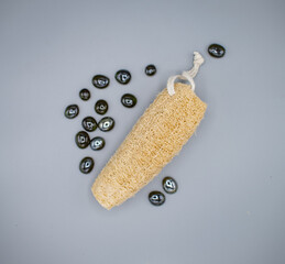 Natural loofah sponge on table, closeup