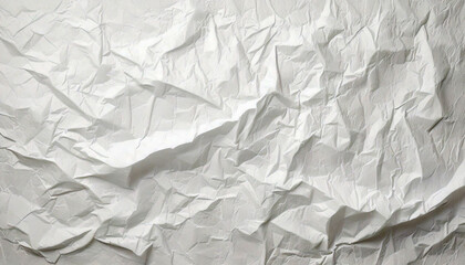 Obraz premium Crumpled White Paper,A crumpled sheet of white paper with various folds and creases.