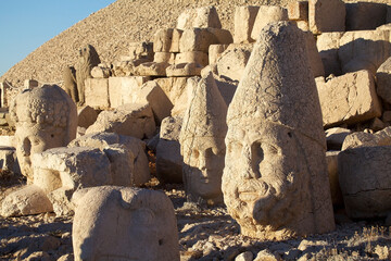 Colossal heads at West terrace at the Mount Nemrut in southeastern Turkey at sunset
