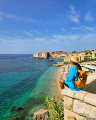 Enjoying the tranquil view of Dubrovnik's stunning coastline on a sunny day