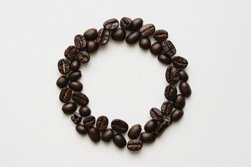 artisan coffee beans arranged in circular pattern