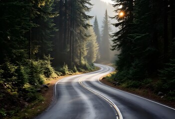 Naklejka premium Winding forest road at misty sunrise through tall pine trees. Curved empty highway in morning woodland. Scenic mountain drive in foggy national park. Adventure travel concept