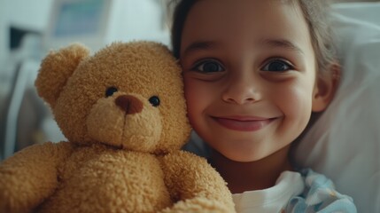 Little warrior, big heart: A joyful girl with a shaved head, spreading hope and strength in a hospital setting.