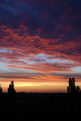 Fototapeta premium Orange sunset and clouds