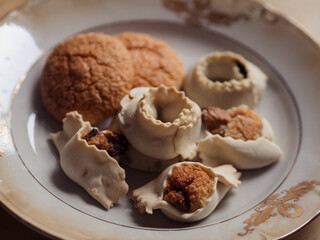 Horizontal Still Life of Sardinian Festive Cookies in a Vintage Beige Golden Plate