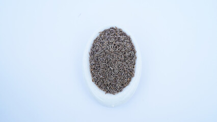 Cumin seeds texture background, caraway seeds