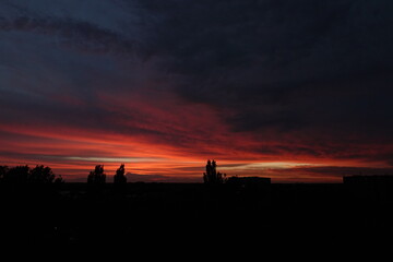 Fototapeta premium Orange sunset and clouds