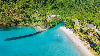 Explore the tranquil beauty of Koh Kood, Thailand with its stunning waters and lush greenery