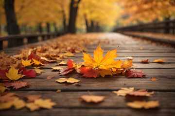 Obraz premium Falling maple leaf's on the empty wooden table top in autumn