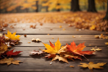 Obraz premium Falling maple leaf's on the empty wooden table top in autumn