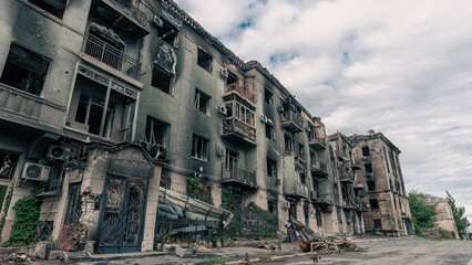 destroyed and burned houses in the city in Ukraine