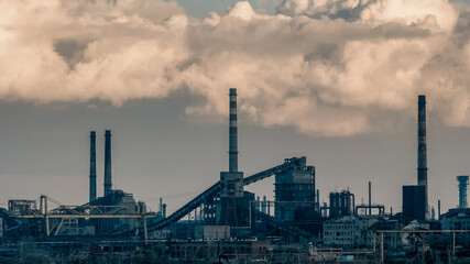 Fototapeta premium destroyed and burned factory buildings in the city in Ukraine