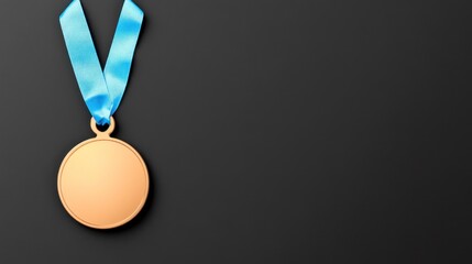 A bronze medal with a blue ribbon on a dark background.