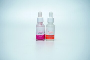 Glass Bottle of Facial Serum isolated on white Background
