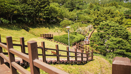 Jeongyang-dong, Tongyeong-si, Gyeongsangnam-do, South Korea  Winter and side view of bronze statue of Admiral Yi on the hill of Yi Sun-sin Park against sea Sea and nature landscape in Tongyeong Yi Sun