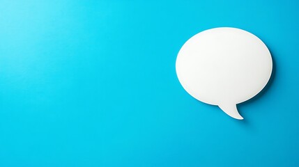 White speech bubble communicating on vibrant blue background