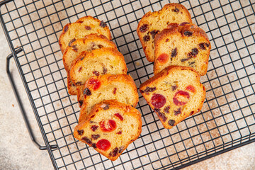 Fruit cake dessert sweet dried fruit traditional pastry, nuts meal food snack on the table copy space food background rustic top view