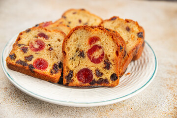 Fruit cake dessert sweet dried fruit traditional pastry, nuts meal food snack on the table copy space food background rustic top view