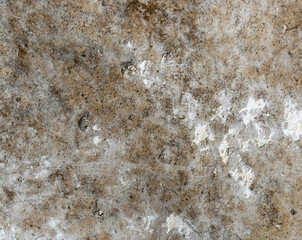 old dirty concrete wall with traces of old plaster. background for design