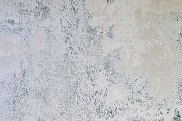 old concrete wall with new white paint and plaster. background for design