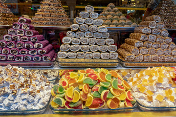 Turkiye. Istanbul. A pyramid of Turkish delight is arranged in a confectionery. The assortment includes a variety of flavors, textures and colors