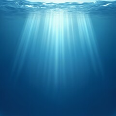 Obraz premium the sun's rays shine into the depths of the ocean, sunlight underwater, impressive seascape, beautiful and calm blue water surface, beautiful nature as a background