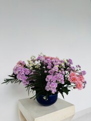 Floral arrangement with pink, purple and white tones for a new year to celebrate luck, prosperity and a good fortune