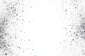 Obraz premium Abstract white background with black splatters, speckled border.