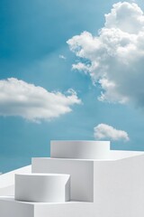 White geometric podium against a blue sky with clouds.