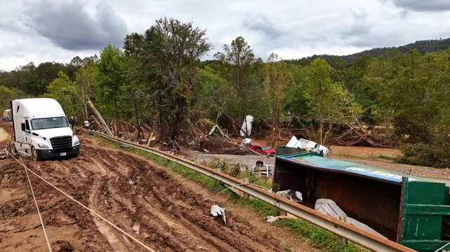 Pile of debris and truck wreckage from Hurricane Helene. Swannanoa, NC.