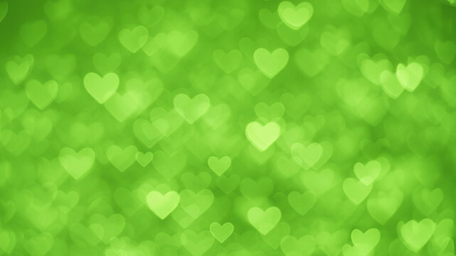 Green hearts bokeh blurred background. Saint Valentine's day pattern texture Overlay