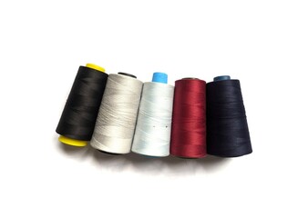 spools of thread isolated on white bakcground stock photo