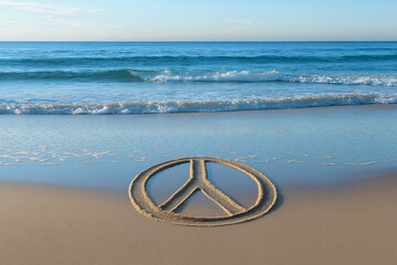 Fototapeta premium Peace sign drawn in golden sand on a serene beach with waves approaching. Symbols of Peace mockup