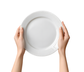 Elegant white plate held in hands on bright background, serving and dining concept