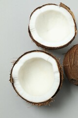 Coconut on gray background, top view