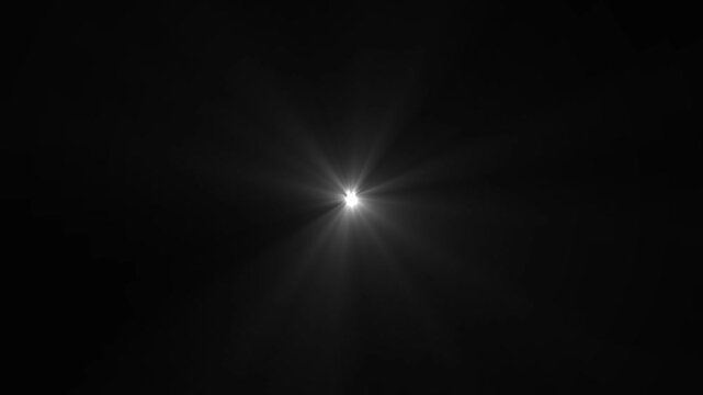 Optical lens flare effect with shiny radiant light beams and a soft glowing aura on a black background, creating a dynamic and ethereal animation. Concept of illumination, radiance, and cinematic 