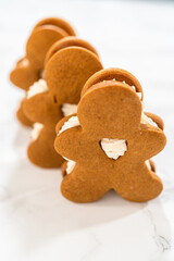 Handcrafted Gingerbread Cookie Sandwiches with Eggnog Buttercream