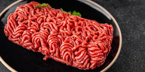 minced meat fresh beef, pork meat tasty eating cooking meal food snack on the table copy space food background rustic top view