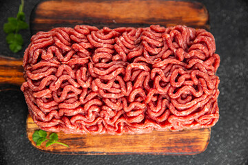 minced meat fresh beef, pork meat tasty eating cooking meal food snack on the table copy space food...
