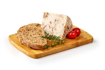Piece of seasoned cheese with herbs, Primavera picante, isolated on white background.