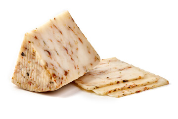 Piece of seasoned cheese with herbs, Primavera picante, isolated on white background.
